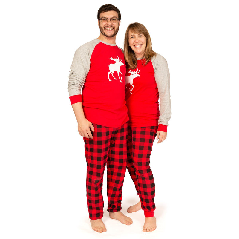 Matching red and black plaid pajamas for the whole family-adults, kids, doll and dog
