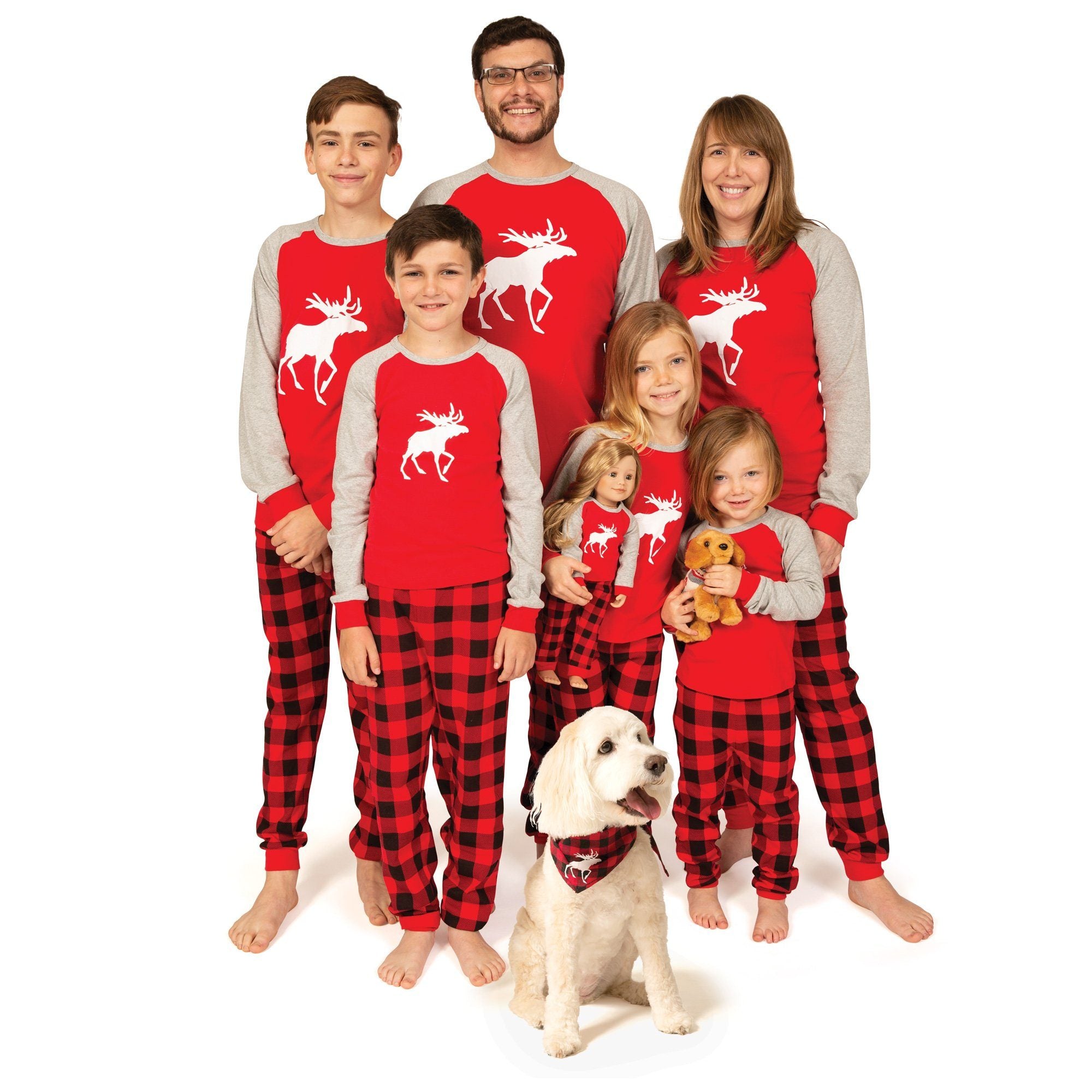 Matching red and black plaid pajamas for the whole family-adults, kids, doll and dog