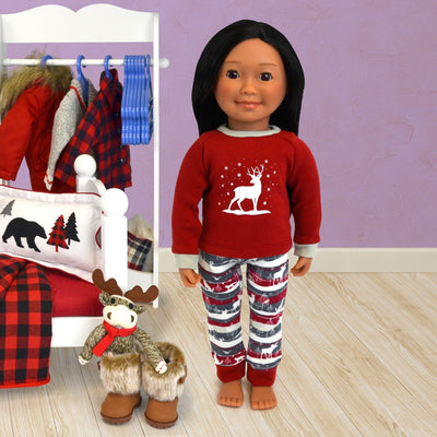 Forest Snow burgundy and grey Pyjamas for dolls includes winter silhouette of woodland animals in a snowy scene nordic pattern bottoms and deer silhouette top shown in 18 inch doll scene with bed and bedding