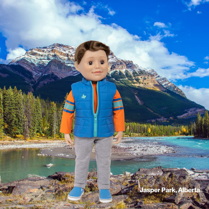 18-inch boy doll from Canada wearing a blue vest, orange shirt and track pants