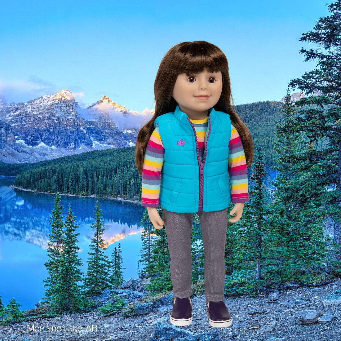 Canadian girl doll with brown eyes and brown hair with bangs