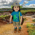18-inch doll dressed to hunt dinosaurs in Alberta Badlands