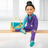 18 inch doll wearing  purple and blue warm-up suit with teal sparkly bodysuit, hair scrunchie and bright green and teal sports bag. Fits all 18 inch dolls.