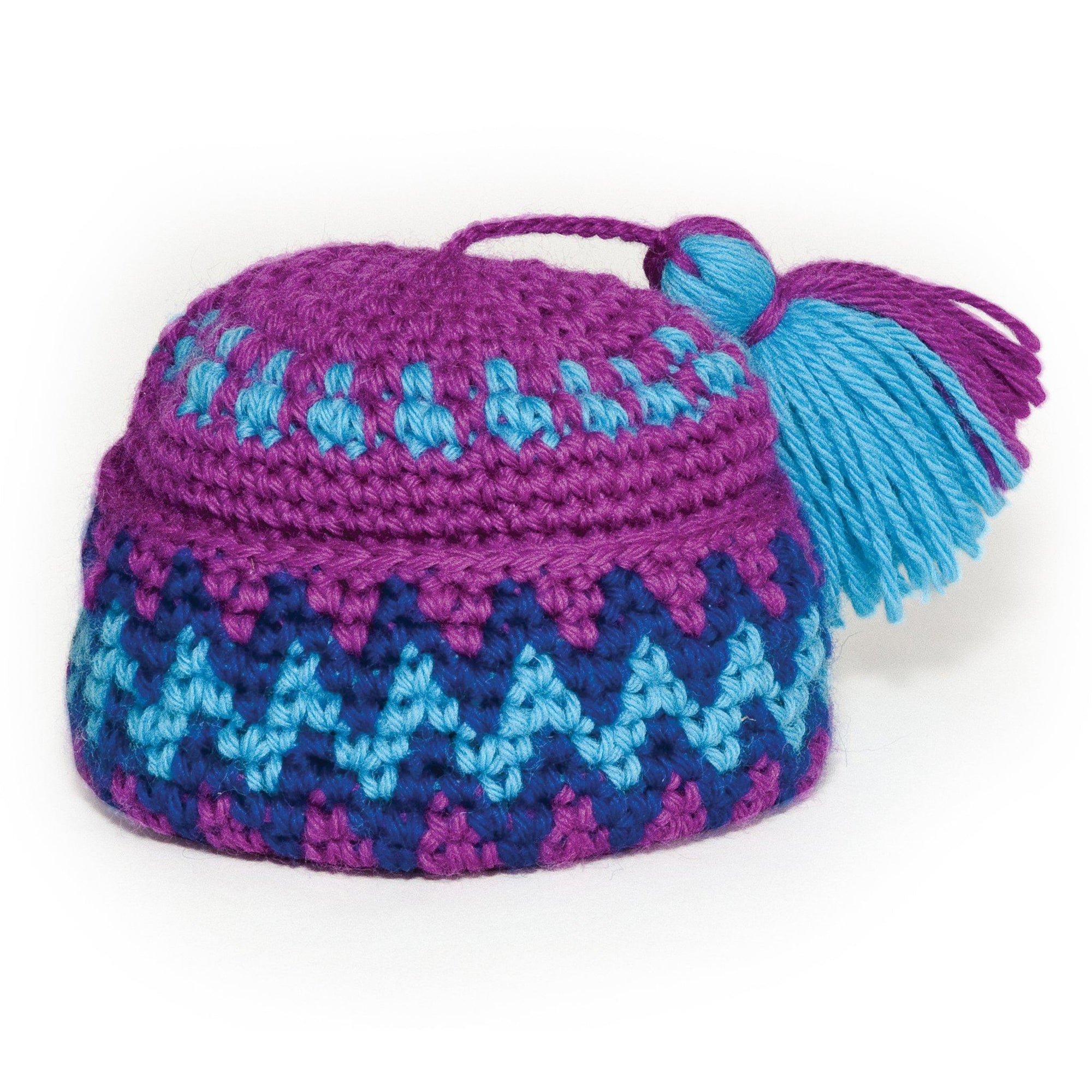Purple and blue hand-knit pang hat fits all 18 inch dolls. 