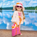 Shoreline Sun white cotton beach cover-up with polka dot tie, white beach hat, pink beach bag, pink sunglasses and polka dot towel fits all 18 inch dolls. 