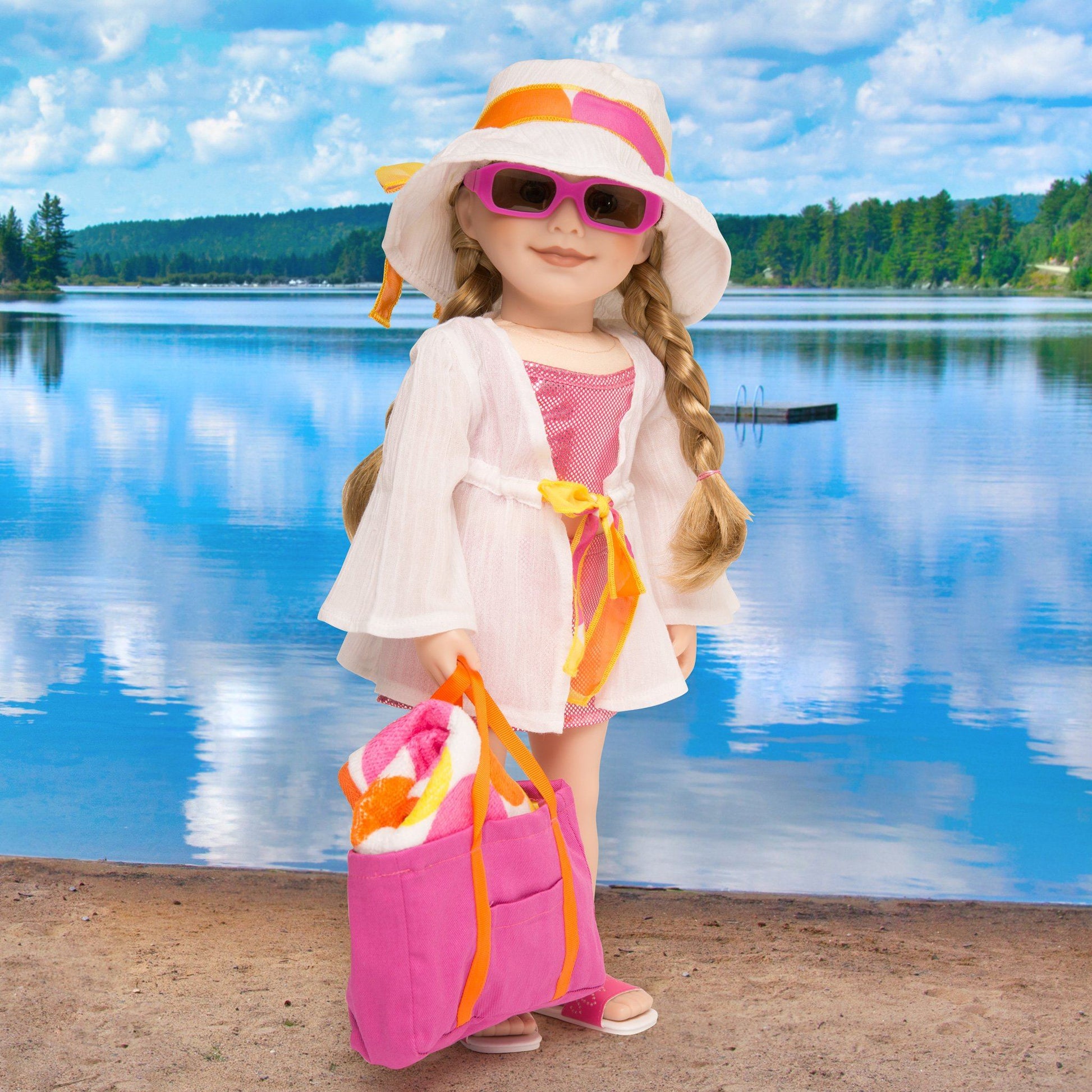 Shoreline Sun white cotton beach cover-up with polka dot tie, white beach hat, pink beach bag, pink sunglasses and polka dot towel fits all 18 inch dolls. 