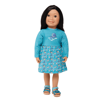 18-inch doll sandals worn by Maplelea doll dressed in co-ordinating teal and aqua dress