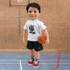 Short-hair doll wearing a white t-shirt with basketball graphic, black gym shorts, runners and socks