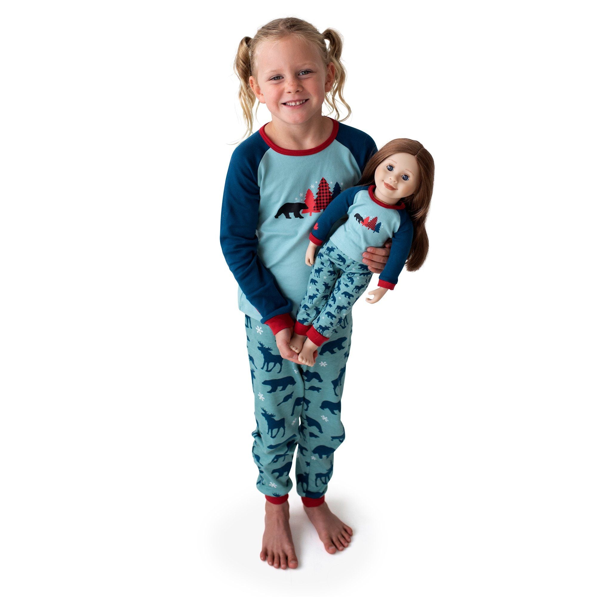 girl with 18 inch doll in matching Canadian pajamas pjs pyjamas