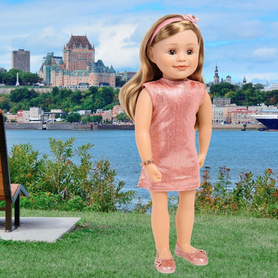 18-inch doll wearing sparkly pink dress and matching sparkly shoes in Quebec