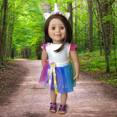 Unicorn Outfit for 18 inch dolls sparkly white iridescent bodysuit colourful layered tulle skirt with flowers and ribbons and a unicorn horn headband shown on Maplelea doll in Ontario Forest
