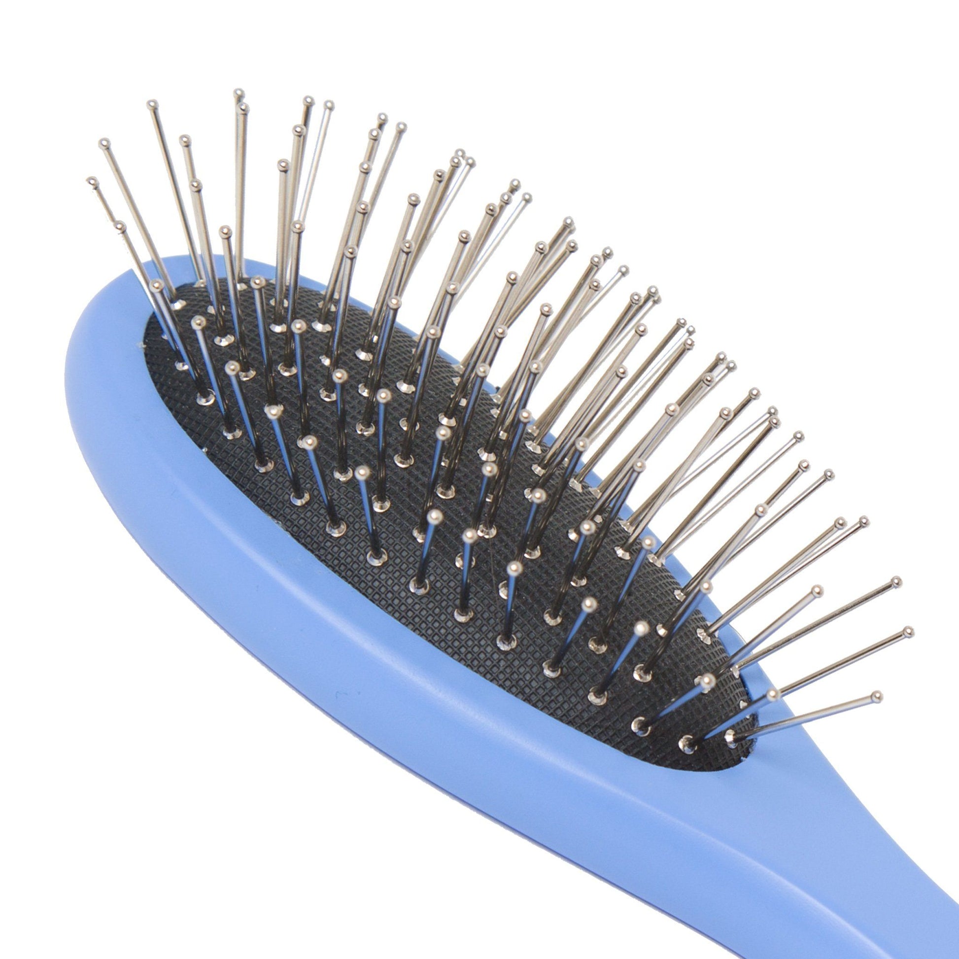 close up of maplelea metal-bristle hair brush for all 18-inch dolls. 