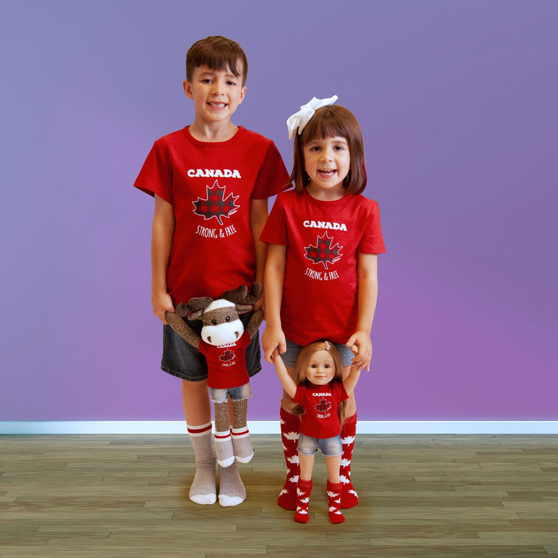 Girl wearing grey with red stripe socks and a girl wearing maple leaf socks, both matching dolls