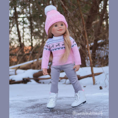 Canadian girl doll skating outdoors wearing a sweater and toque